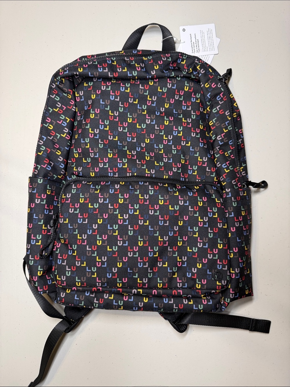 NWT Lululemon Everywhere Backpack Tech Canvas LULU WordMark Black Multi 22L